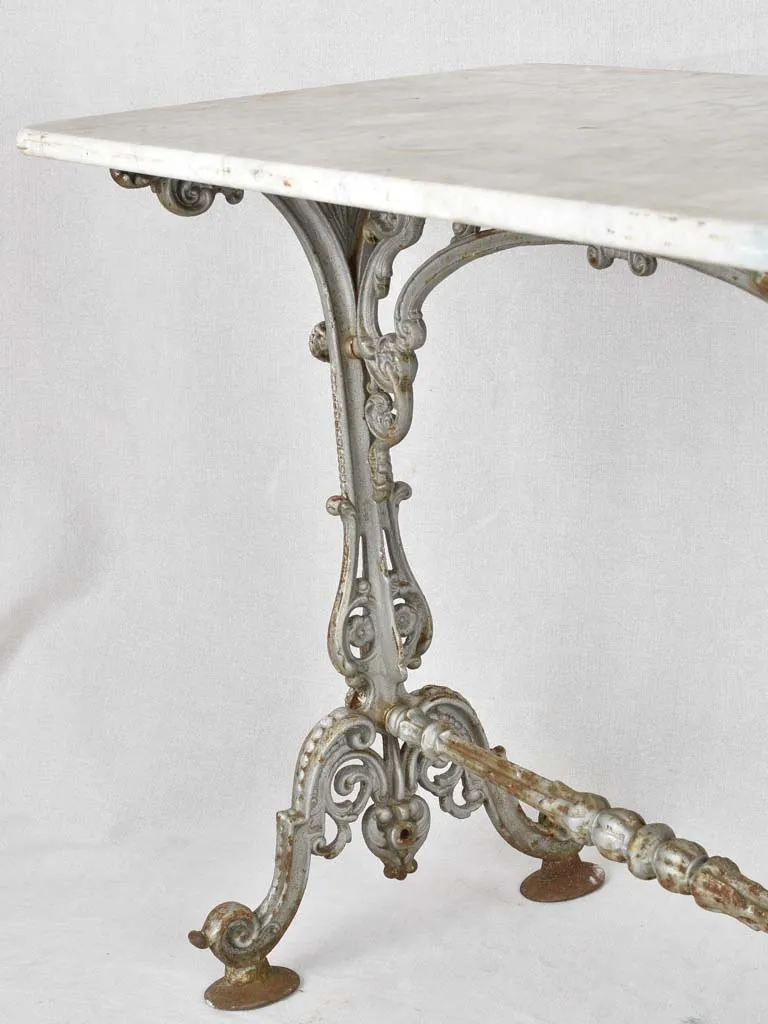 Rectangular marble and cast iron bistro table 35½" x 19¾"